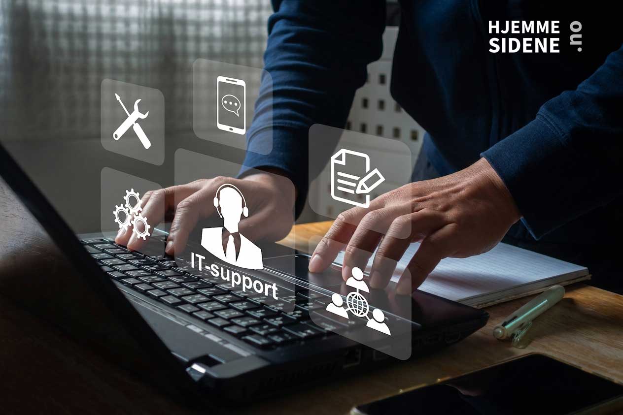 it_support En mann gir IT-support via datamaskinen.
